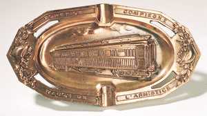 144. An ashtray from the Coches Camas Company.