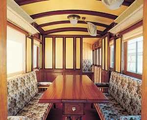 39. The inside of a lounge carriage from the Vasco-Navarro Railway.