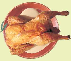 105. Pollo con salsa de cebolla y especias.© Xabi Otero