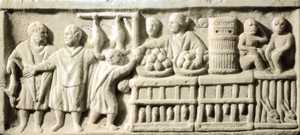 72. Market scenes like the one shown in this bas-relief would have been commonplace in the towns of Gipuzkoa. © Ed. Dolmen