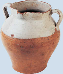 160. Butter jar with carved decorations and a spout.© Jose Lpez